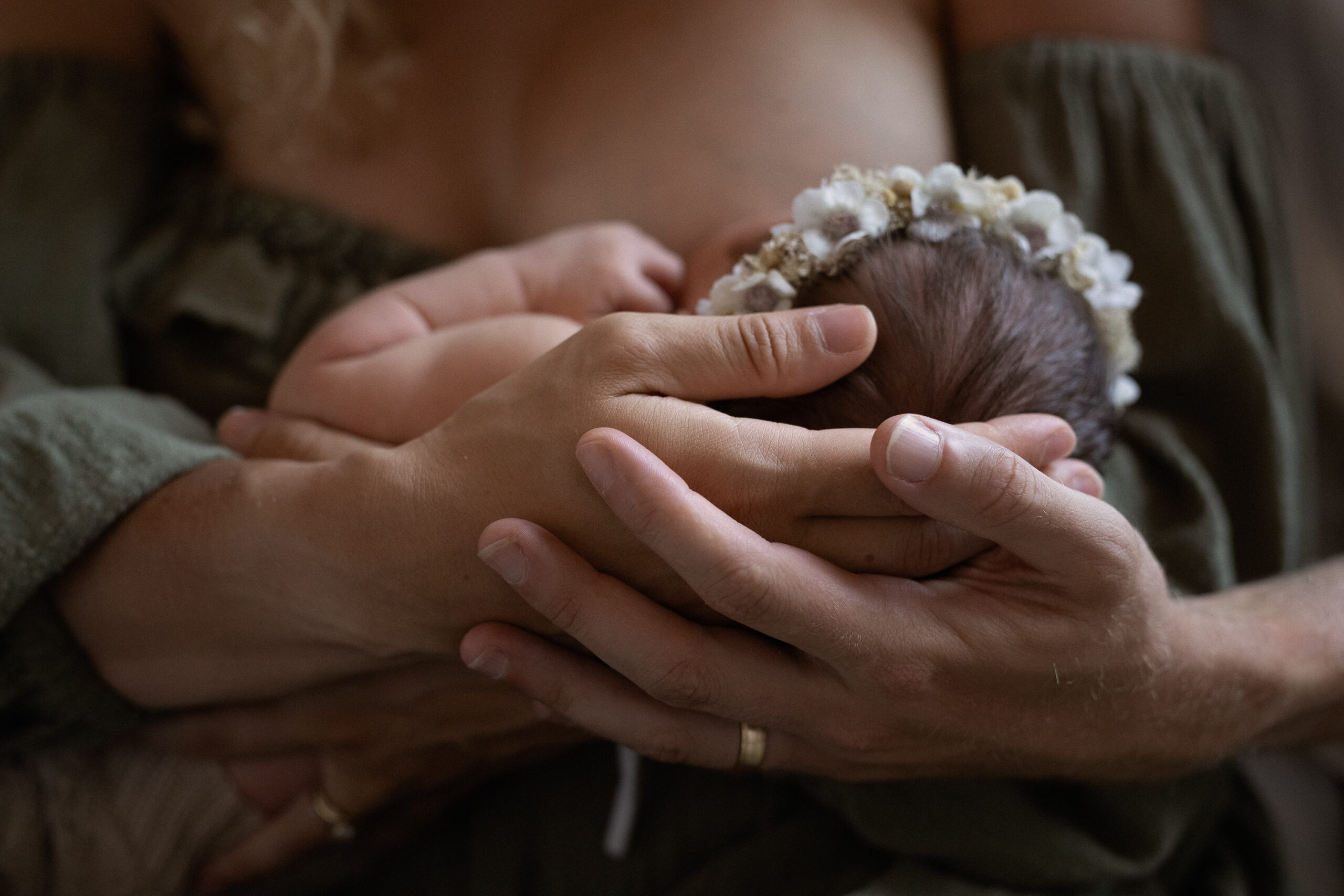 mom nursing newborn during Grand Rapids photo session
